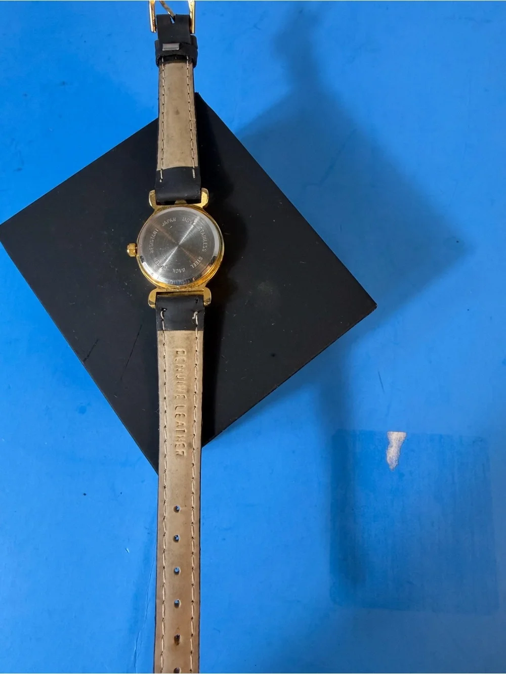Gold Dial Black Leather Strap Women's Watch with American Flag Accent